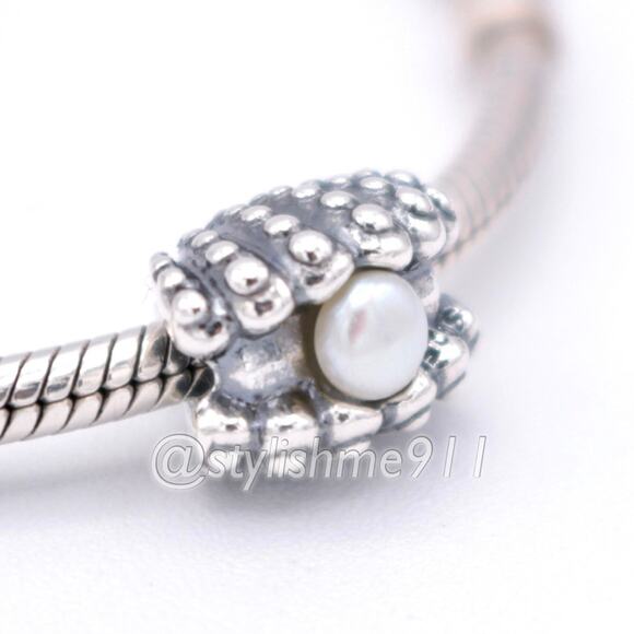 Authentic PANDORA One of a Kind Shell Charm - 791134P - Picture 1 of 12